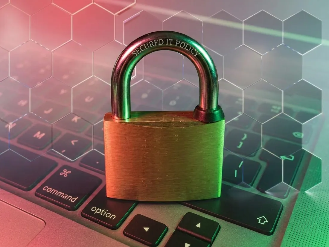 A padlock on a MacBook keyboard
